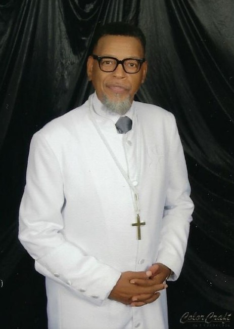 Pastor Davis white robe 2.jpg